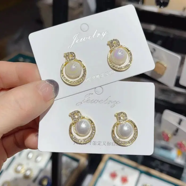 Radiant Pearl Halo Studs