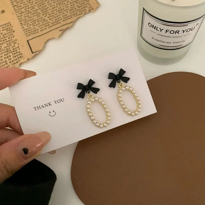 Midnight Bow Pearl Loop Earrings