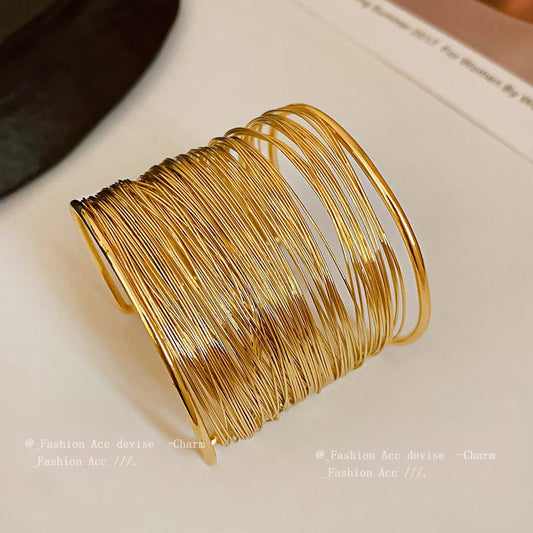 Radiant Gold Thread Cuff Bracelet