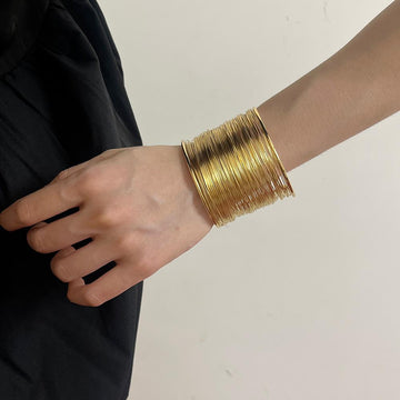 Radiant Gold Thread Cuff Bracelet