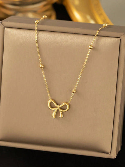 Golden Bow Bead Necklace