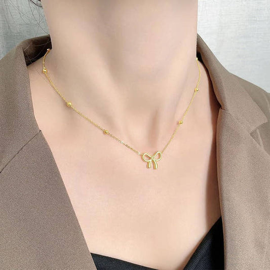 Golden Bow Bead Necklace